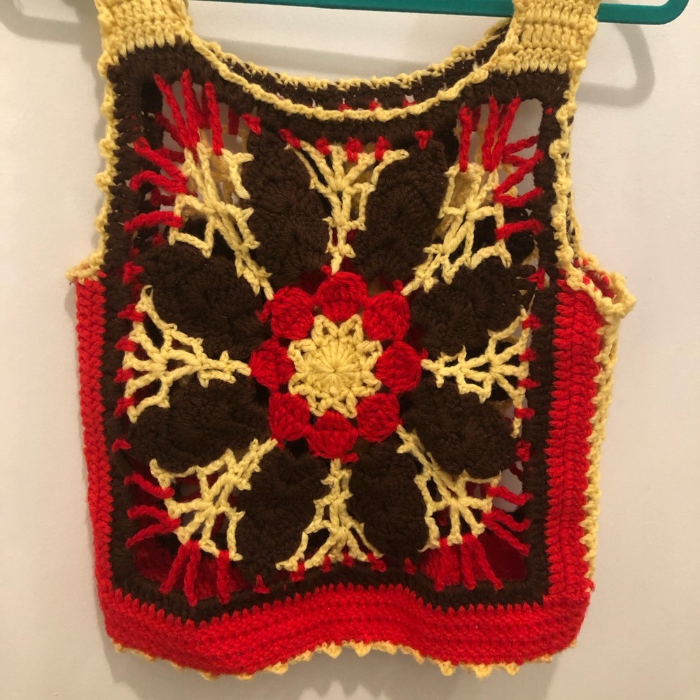 Super cute yarn handmade vintage afghan vest. Size small Size 4.